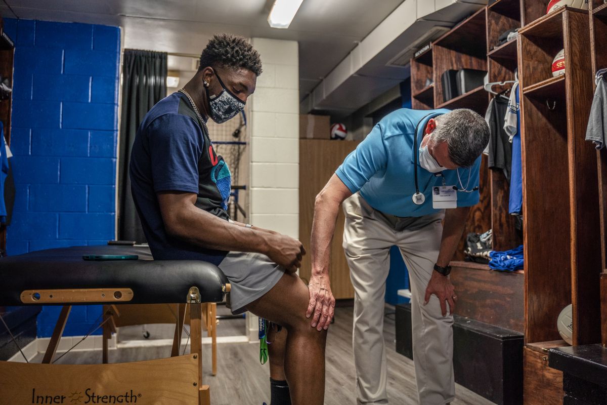 Athletic Trainer and Athlete Athletic Trainer and Athlete